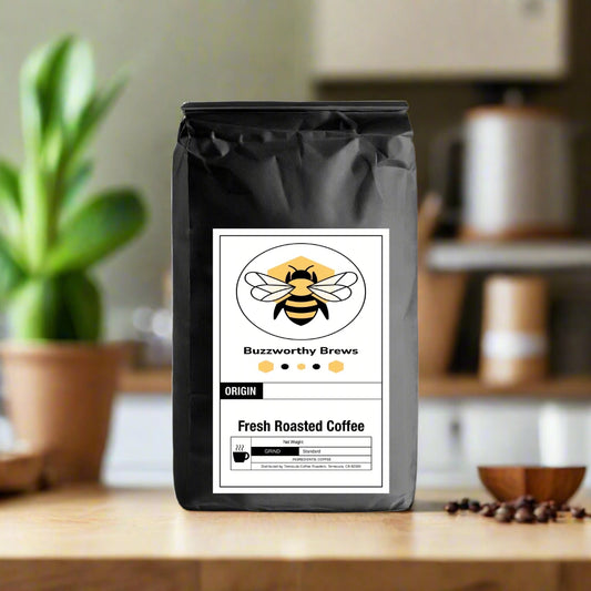 Bag of Buzzworthy Brews Italian Roast Coffee, a slow-roasted blend of specialty-grade Arabica and Robusta for a bold, intense flavor.